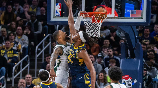 Milwaukee Bucks guard Damian Lillard (0) shoots the ball while Indiana Pacers center Myles Turner (33)