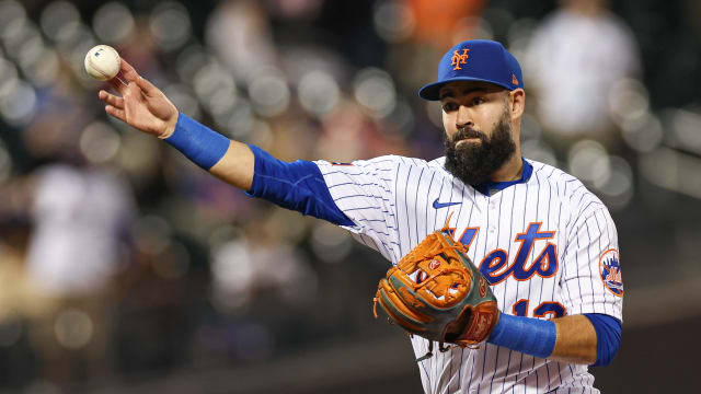Sep 27, 2023; New York City, New York, USA; New York Mets second baseman Luis Guillorme (13) throws the ball to first base for an out during the ninth inning against the Miami Marlins at Citi Field.