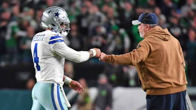 Nov 5, 2023; Philadelphia, Pennsylvania, USA; Dallas Cowboys quarterback Dak Prescott (4) and head coach Mike McCarthy after a touchdown in the third quarter against the Philadelphia Eagles at Lincoln Financial Field. 