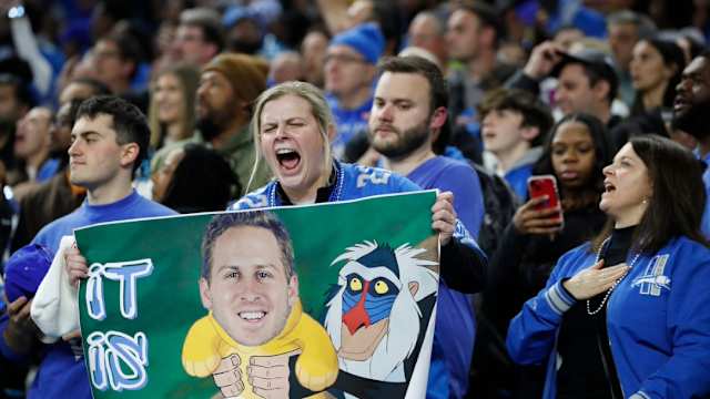 Detroit Lions fan holds a Jared Goff sign.