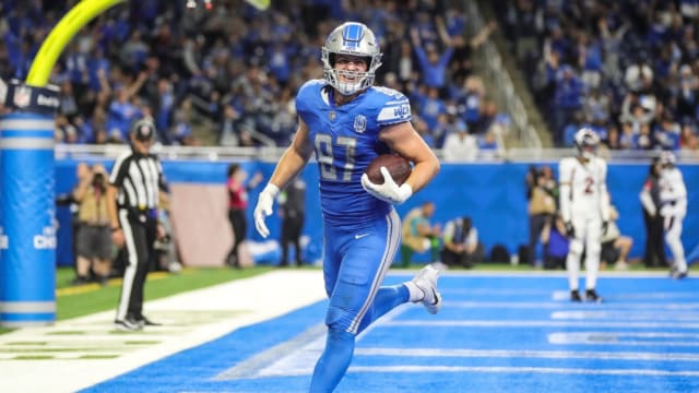 Detroit Lions tight end Sam LaPorta scores a touchdown against Denver Broncos.