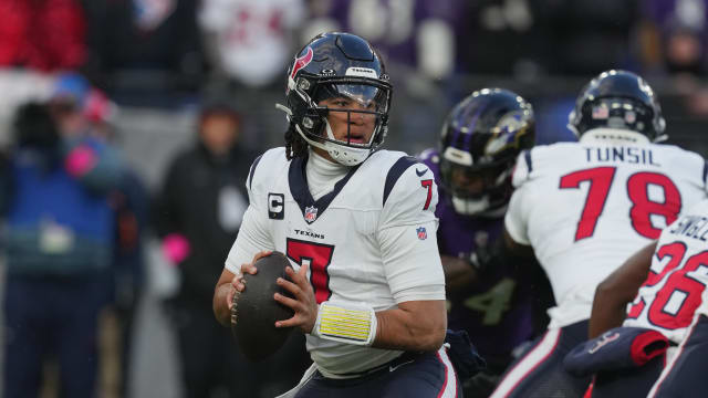 Jan 20, 2024; Baltimore, MD, USA; Houston Texans quarterback C.J. Stroud (7) drops back to pass against the Baltimore Ravens in the first half of a 2024 AFC divisional round game at M&T Bank Stadium.