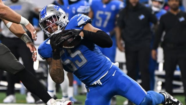 Detroit Lions linebacker Derrick Barnes intercepts a pass against the Tampa Bay Buccaneers.