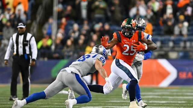 Feb 23, 2023; Seattle, WA, USA; Seattle Sea Dragons running back Morgan Ellison (25) and St. Louis Battlehawks defensive back Ben DeLuca (28) during the first half at Lumen Field. St. Louis defeated Seattle 20-18. Mandatory Credit: Steven Bisig-USA TODAY Sports  