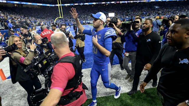 Detroit Lions quarterback Jared Goff waves to fans after defeating the Tampa Bay Buccaneers in the NFC Divisional Round.