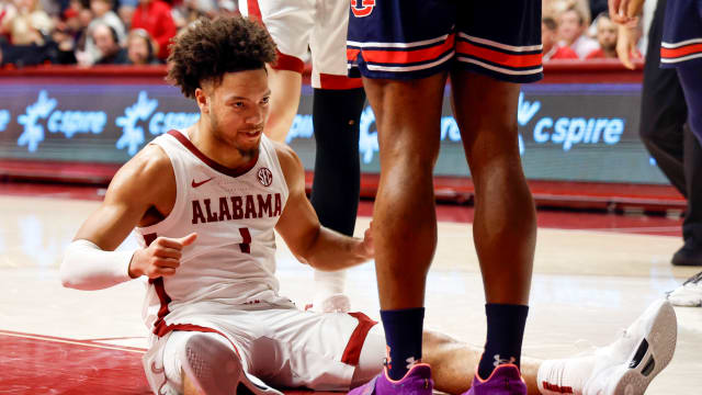 Alabama Crimson Tide guard Mark Sears (1) reacts after he was fouled while making a basket during the second half against the Auburn Tigers at Coleman Coliseum.