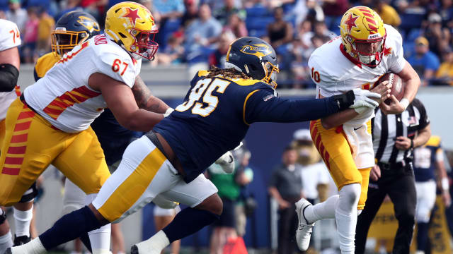 Apr 15, 2023; Memphis, TN, USA; Memphis Showboats defensive linemen Jordan Williams (95) tackles Philadelphia Stars quarterback Case Cookus (10) during the first half at Simmons Bank Liberty Stadium. Mandatory Credit: Petre Thomas-USA TODAY Sports