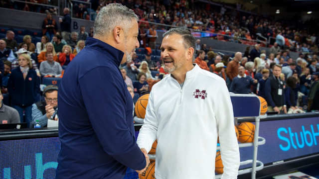 Auburn Tigers head coach Bruce Pearl and Mississippi State Bulldogs head coach Chris Jans shake hands before the game as Auburn Tigers take on Mississippi State Bulldogs at Neville Arena in Auburn, Ala., on Saturday, Jan. 14, 2023.