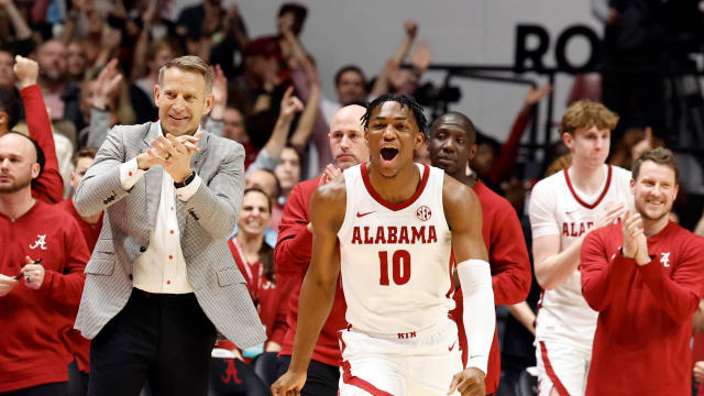 Jan 24, 2024; Tuscaloosa, Alabama, USA; Alabama Crimson Tide head coach Nate Oats and forward Mouhamed Dioubate (10) react to defeating the Auburn Tigers at Coleman Coliseum. Mandatory Credit: Butch Dill-USA TODAY Sports