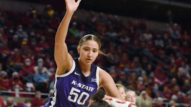 Iowa State Cyclones center Beatriz Jordo (25) looks for a drive around Kansas State Wildcats center Ayoka Lee (50) during the second quarter at Hilton Coliseum Wednesday, Feb. 2, 2022, in Ames, Iowa.