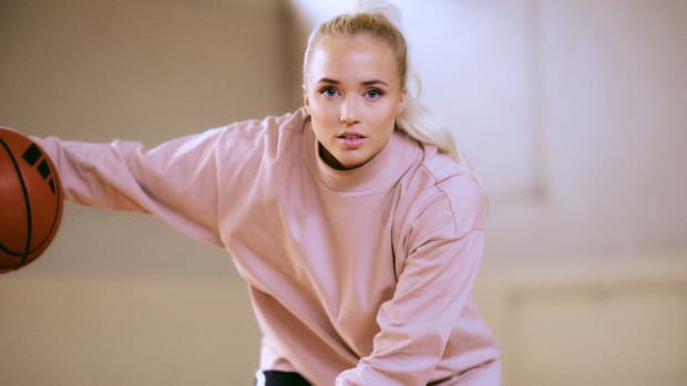 Hailey Van Lith dribbles a basketball in an adidas photo shoot.