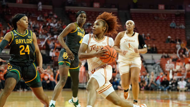 Feb 6, 2022; Austin, Texas, USA; Texas Longhorns guard Rori Harmon (3) drives to the basket against Baylor Lady Bears guard Sarah Andrews (24) during the first half at Frank C. Erwin Jr. Center. Mandatory Credit: Chris Jones-USA TODAY Sports