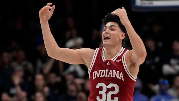 Indiana Hoosiers guard Trey Galloway (32) calls back his offense as they lead with less than a minute remaining in the second half of the NCAA basketball game between the Xavier Musketeers and the Indiana Hoosiers at the Cintas Center in Cincinnati on Friday, Nov. 18, 2022. Xavier fell to the Hoosiers, 81-79.
