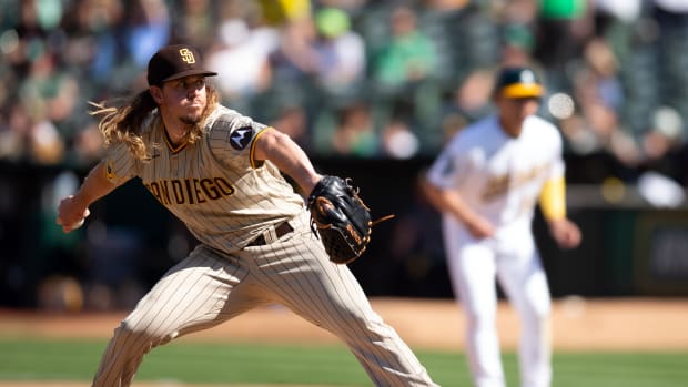 Sep 16, 2023; Oakland, California, USA; San Diego Padres pitcher Scott Barlow (58) pitches against the Oakland Athletics during the sixth inning at Oakland-Alameda County Coliseum. Mandatory Credit: D. Ross Cameron-USA TODAY Sports