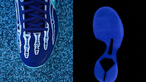 Black and blue Nike Kobe sneakers.