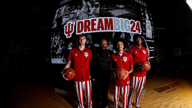 Liam McNeeley Mike Woodson Curtis Givens Derik Queen
