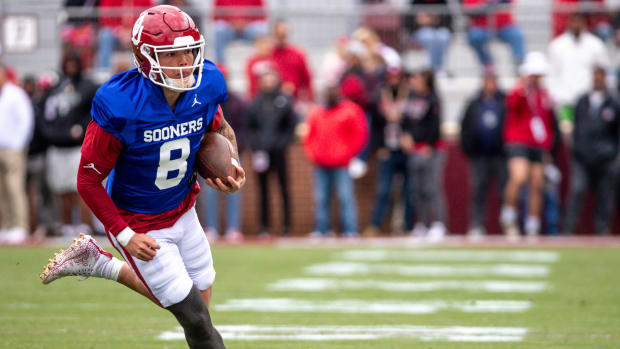 Oklahoma Sooners quarterback Dillon Gabriel runs the ball during a scrimmage.