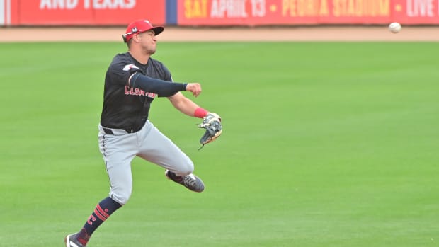 Feb 26, 2024; Peoria, Arizona, USA; Cleveland Guardians third baseman Tyler Freeman (2) throws to first base in the third inning against the San Diego Padres during a spring training game at Peoria Sports Complex. Mandatory Credit: Matt Kartozian-USA TODAY Sports