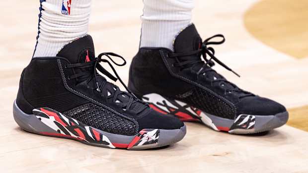 New Orleans Pelicans forward Brandon Ingram's black and grey Air Jordan sneakers.