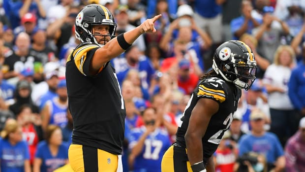 Steelers quarterback Ben Roethlisberger (7) gestures as running back Najee Harris (22) looks on against the Bills during the first half at Highmark Stadium.