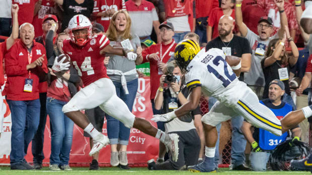 Rahmir Johnson sprints toward the end zone for a 41-yard touchdown on a pass from Adrian Martinez late in the third quarter.