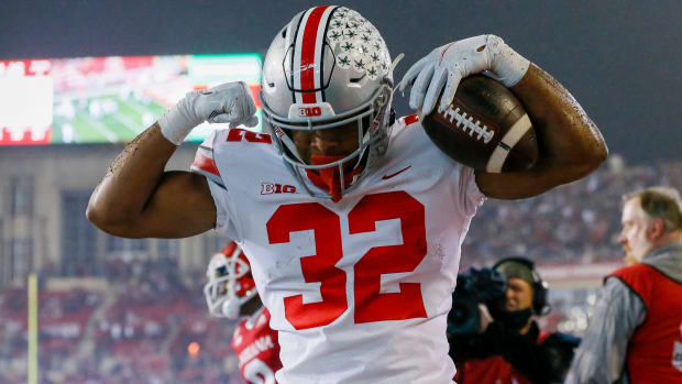 Ohio State Buckeyes player TreVeyon Henderson in action during a college football game in the Big Ten.