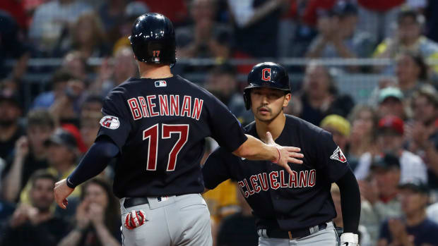 Jul 17, 2023; Pittsburgh, Pennsylvania, USA; Cleveland Guardians left fielder Steven Kwan (38) greets center fielder Will Brennan (17) as Brennan scores a run against the Pittsburgh Pirates during the fifth inning at PNC Park. Mandatory Credit: Charles LeClaire-USA TODAY Sports