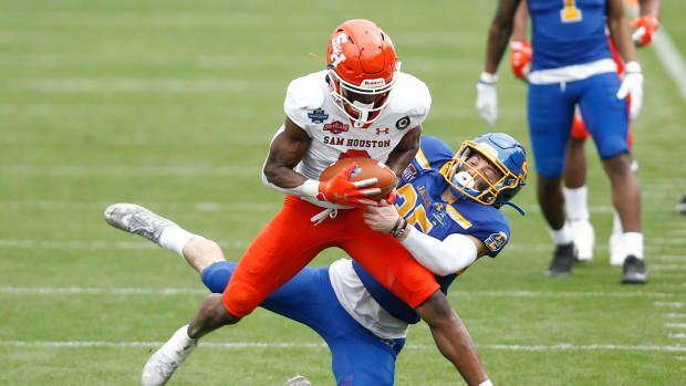 Sam Houston State Bearkats wide receiver Ife Adeyi (2) catches a pass against South Dakota State Jackrabbits safety Chase Norblade (35) during the Division I FCS Championship football game at Toyota Stadium