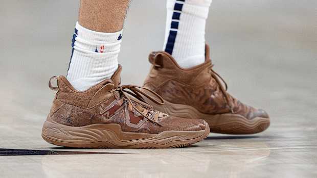 View of Jamal Murray's brown New Balance shoes.
