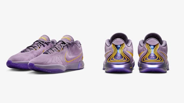 Side view of LeBron James' purple and gold Nike sneakers.