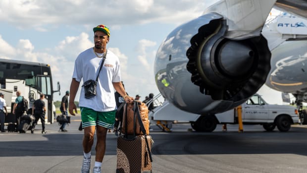 Philadelphia Eagles quarterback Jalen Hurts wore a pair of Air Jordan 11 'Cool Grey' basketball shoes on the team flight this week.