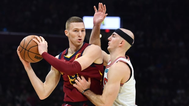 Chicago Bulls guard Alex Caruso (6) defends Cleveland Cavaliers guard Dylan Windler (9) during the first half at Rocket Mortgage FieldHouse.