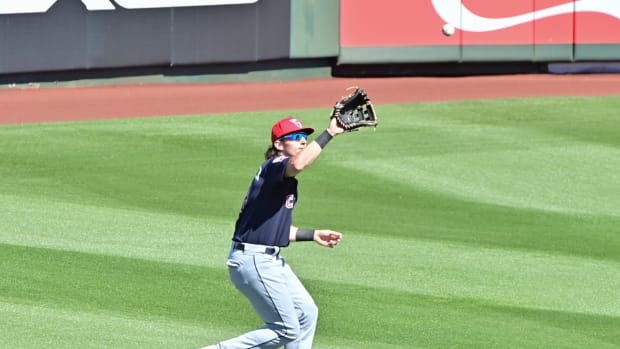 Feb 29, 2024; Tempe, Arizona, USA; Cleveland Guardians right fielder Chase DeLauter (6) catches a fly ball in the third inning against the Los Angeles Angels during a spring training game at Tempe Diablo Stadium. Mandatory Credit: Matt Kartozian-USA TODAY Sports