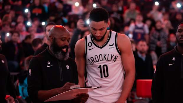Brooklyn Nets head coach Jacque Vaughn with guard Ben Simmons