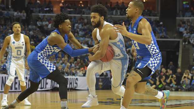 Kentucky Wildcats guards De'Aaron Fox and Isaiah Briscoe play defense.