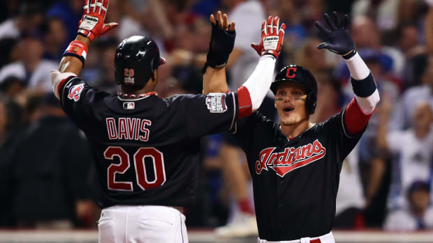Nov 2, 2016; Cleveland, OH, USA; Cleveland Indians center fielder Rajai Davis (20) is congratulated by teammate Brandon Guyer (6) after hitting a two-run home run against the Chicago Cubs in the 8th inning in game seven of the 2016 World Series at Progressive Field. Mandatory Credit: Ken Blaze-USA TODAY Sports