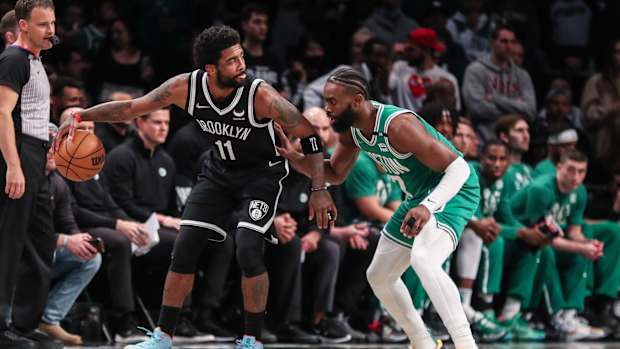Kyrie Irving wears Nike Dunks and Jaylen Brown wears Yeezy's when hanging out with Kanye West.