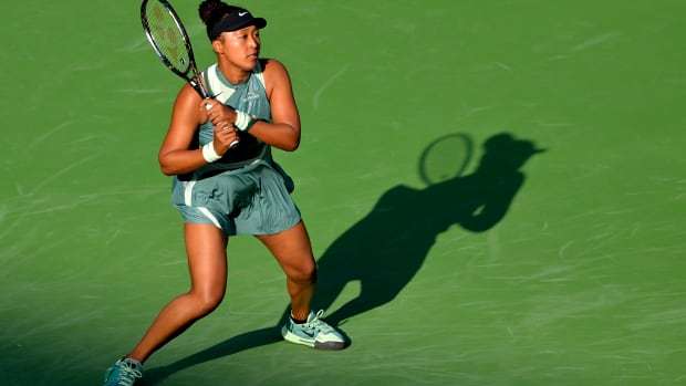 Naomi Osaka hits a shot at the Indian Wells Tennis Garden.
