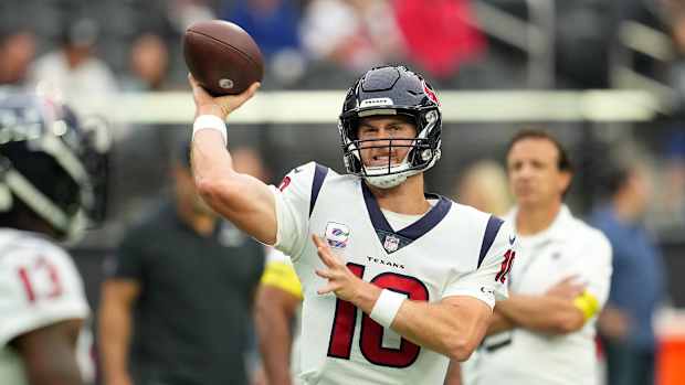 Houston Texans quarterback Davis Mills (10) warms up before a game against the Las Vegas Raiders at Allegiant Stadium