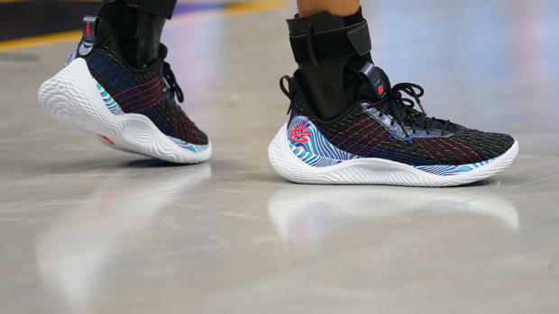 View of Stephen Curry's black and blue shoes.