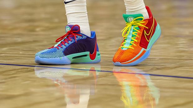 View of Sabrina Ionesci's multicolor Nike sneakers.