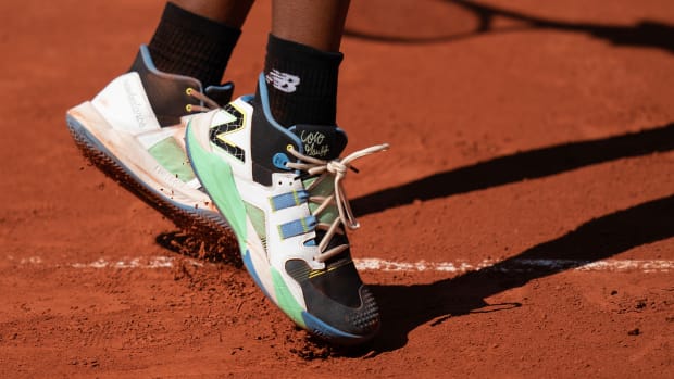 View of Coco Gauff's black and green New Balance shoes at the French Open.