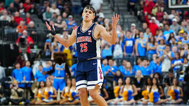 Arizona Wildcats guard Kerr Kriisa celebrates after scoring.
