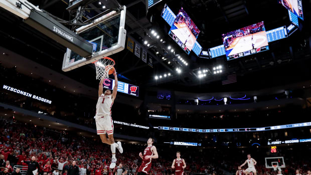 Johnny Davis throwing down a breakaway dunk against Colgate.