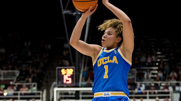 UCLA Bruins guard Kiki Rice shoots the ball.