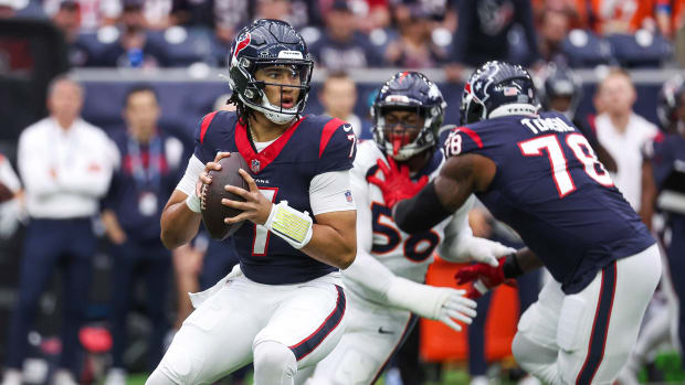 Texans quarterback C.J. Stroud looks for an open receiver during the first quarter against the Denver Broncos at NRG Stadium.