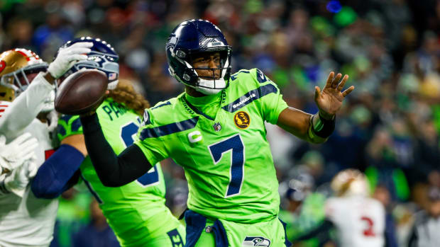 Seattle Seahawks quarterback Geno Smith (7) passes against the San Francisco 49ers during the third quarter at Lumen Field.