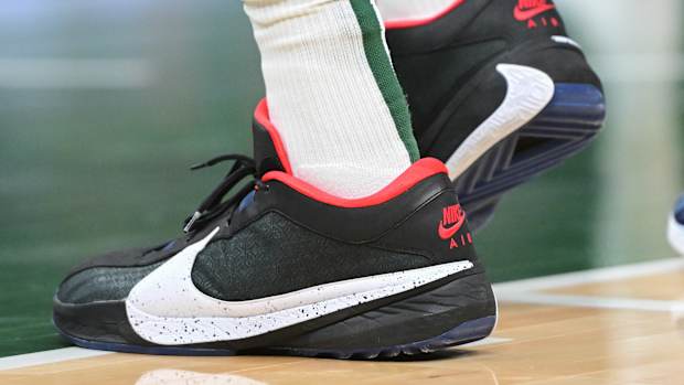 Giannis Antetokounmpo's navy and white 'Uconn Huskies' shoes.