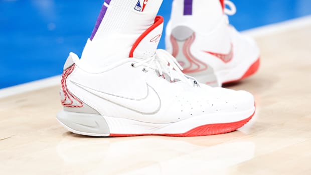 Los Angeles Lakers forward LeBron James' white and red Nike sneakers.