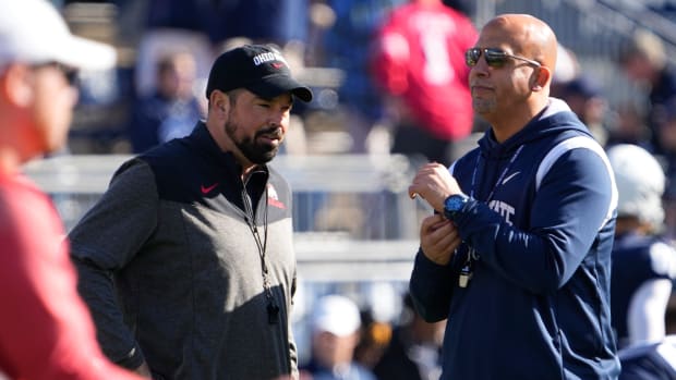 Ohio State Buckeyes head coach Ryan Day talks to Penn State Nittany Lions head coach James Franklin prior to the NCAA Division I football game at Beaver Stadium.
